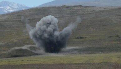 A tractor exploded after hitting a mine.
