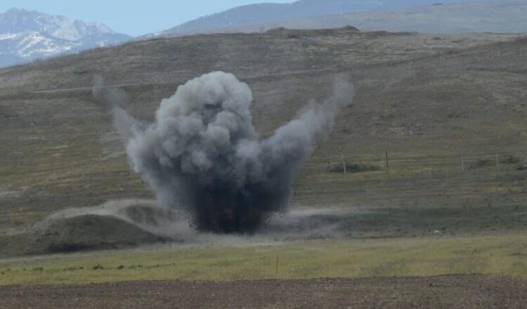 A tractor exploded after hitting a mine.