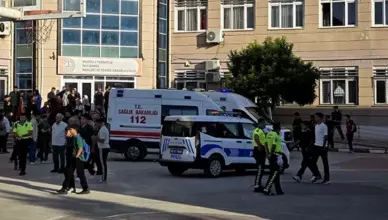 An unidentified person has opened fire in the direction of a school; what is happening?